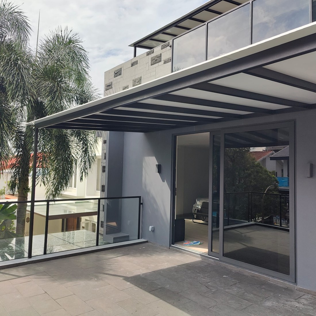 Roof extension over a patio, installed by Roofers